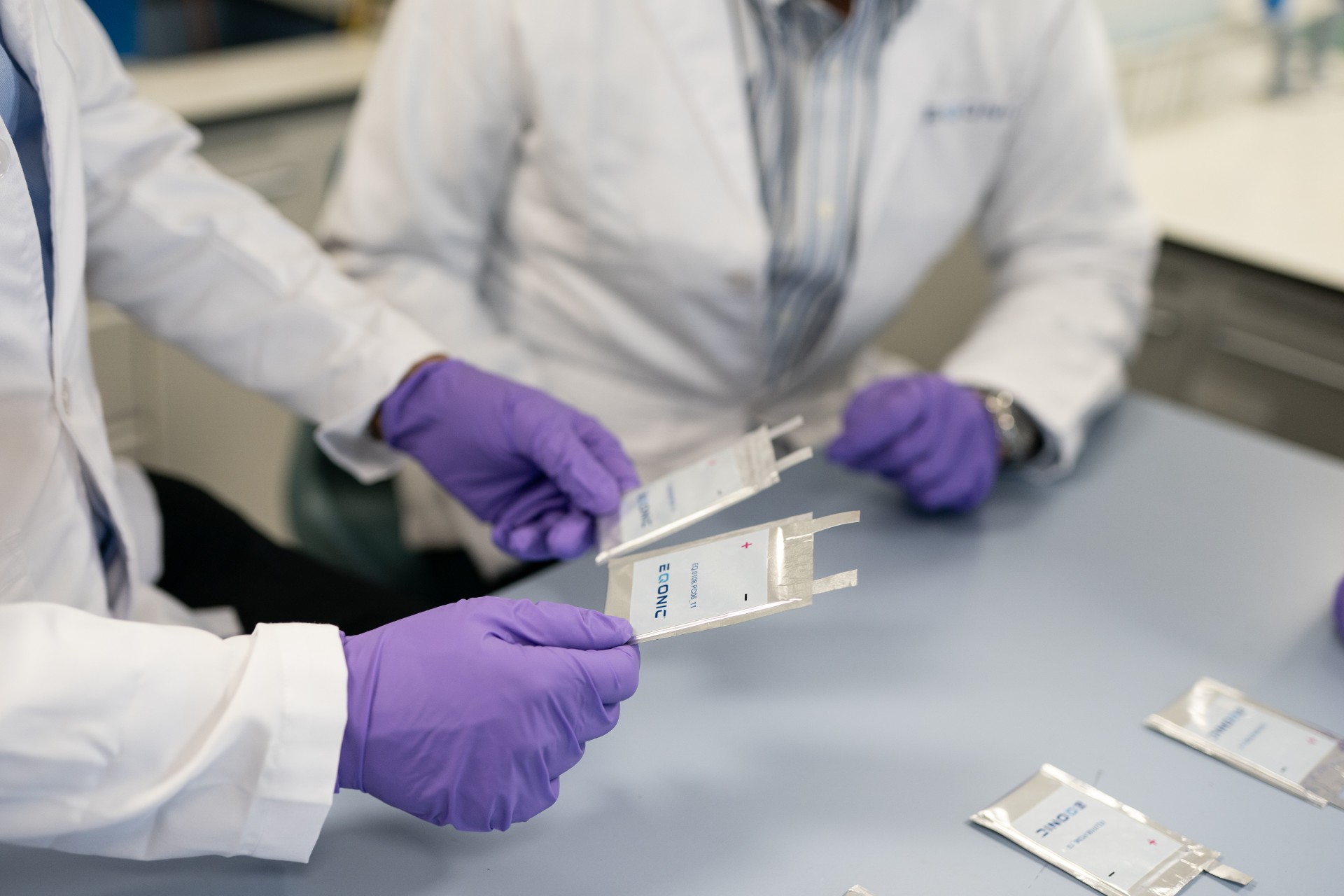 Scientists working in a battery innovation laboratory